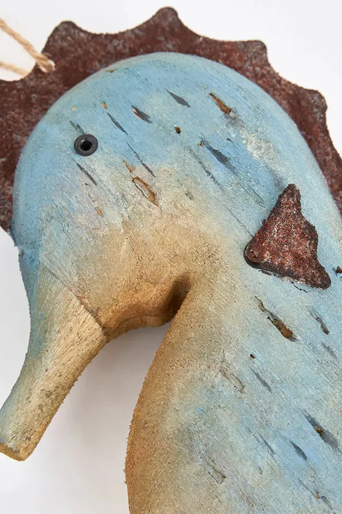 Colgante caballito de mar en madera y metal