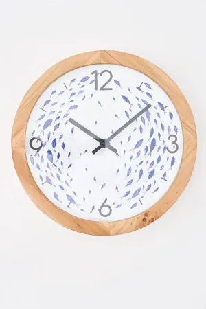 Reloj con banco de peces